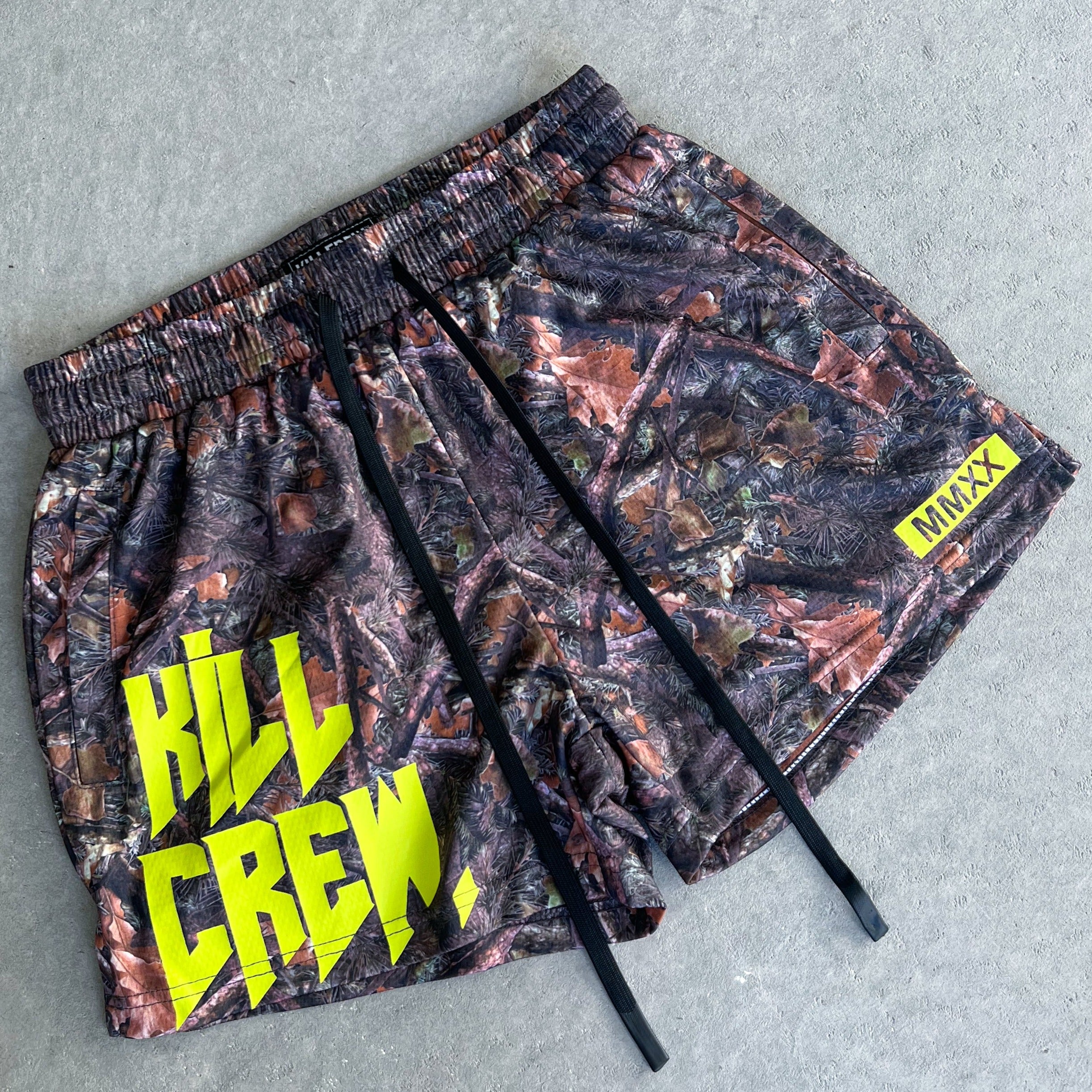 MUAY THAI SHORTS (MID THIGH CUT) - CAMO / GREEN