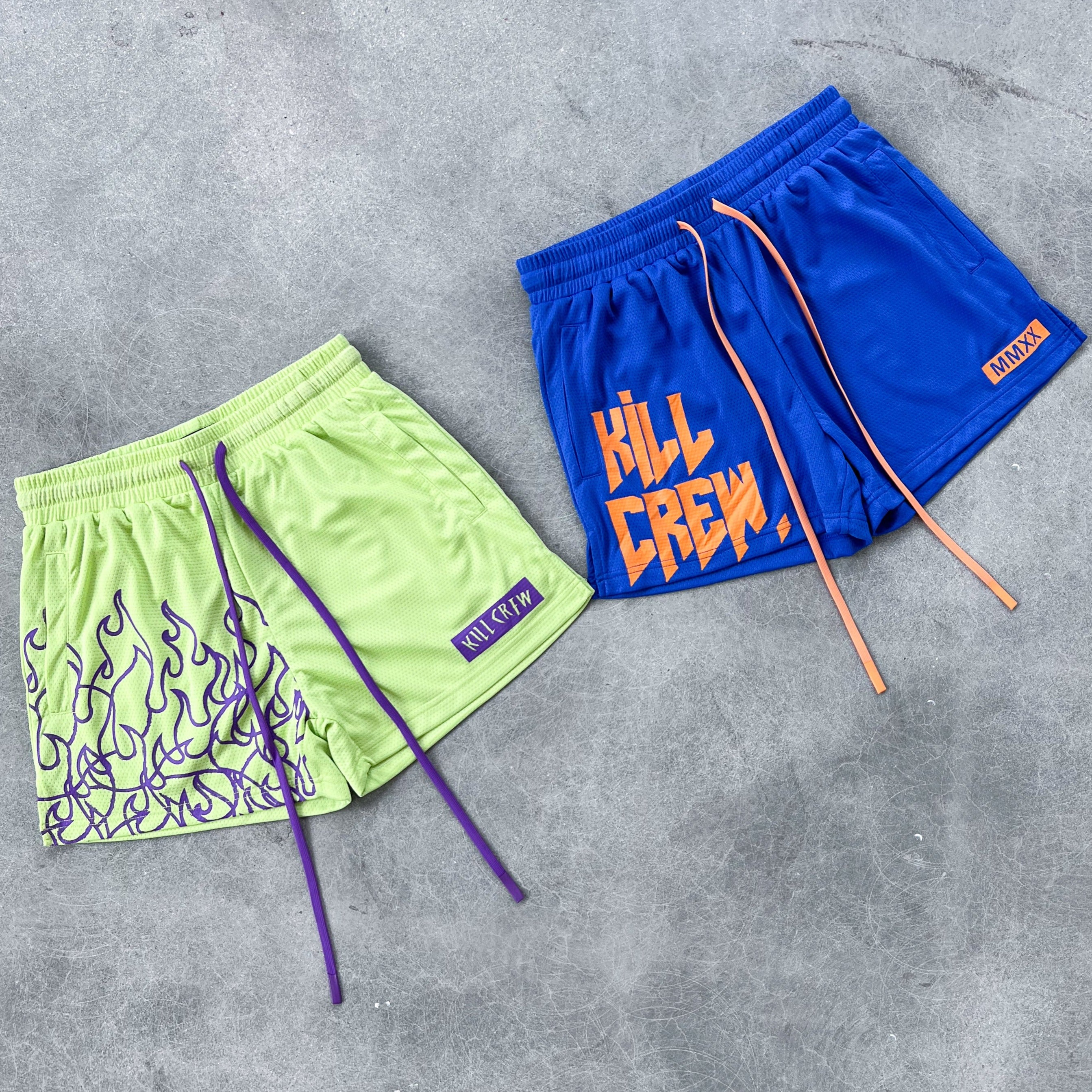 MUAY THAI FLAME SHORTS (MID THIGH CUT) - GREEN / PURPLE