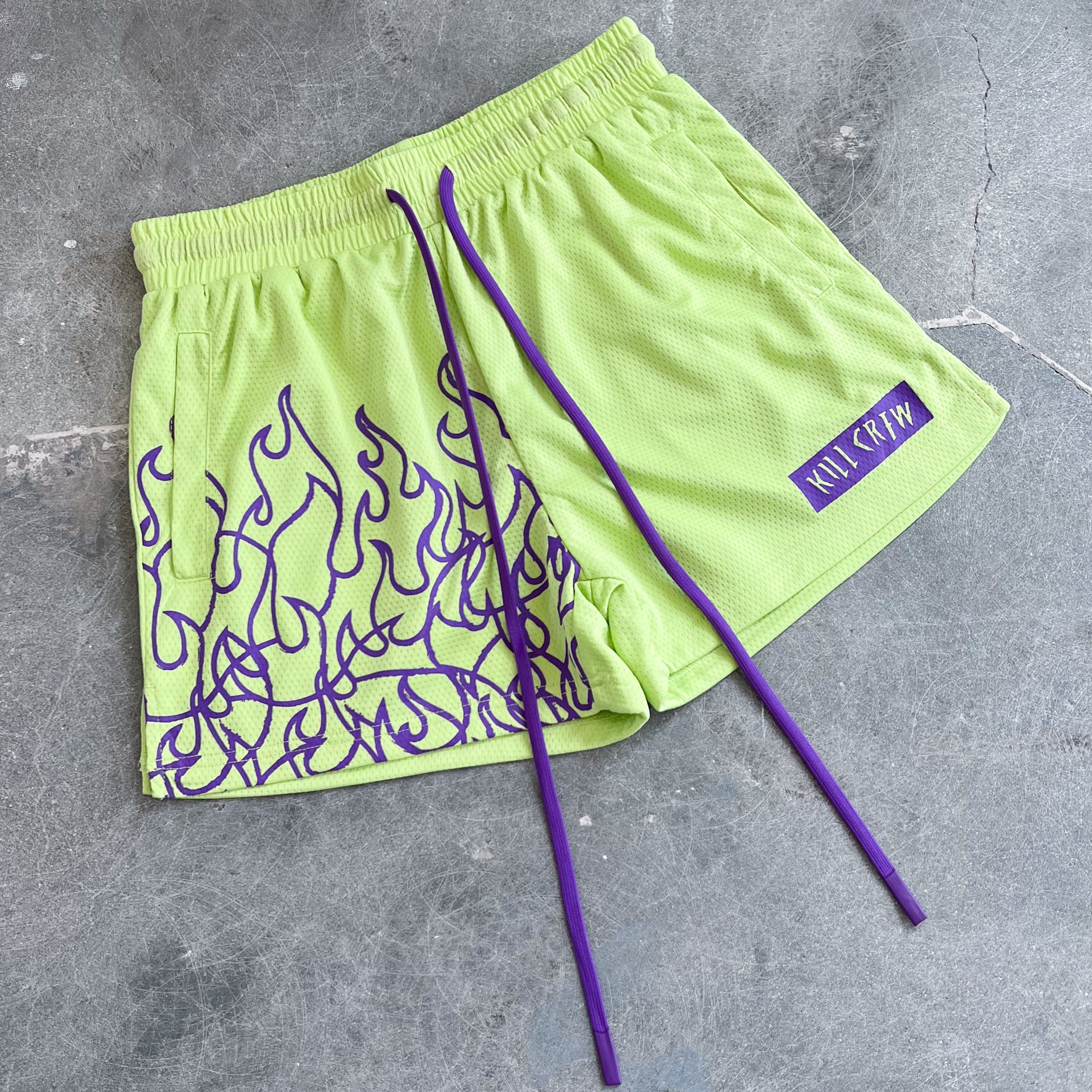 MUAY THAI FLAME SHORTS (MID THIGH CUT) - GREEN / PURPLE