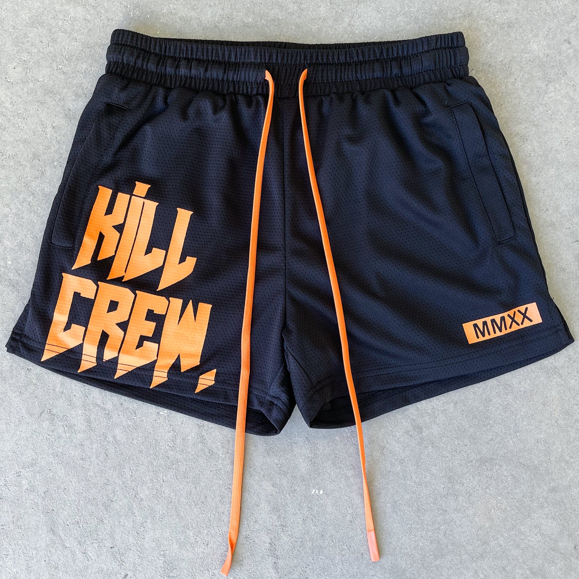 MUAY THAI SHORTS (MID THIGH CUT) - BLACK / ORANGE