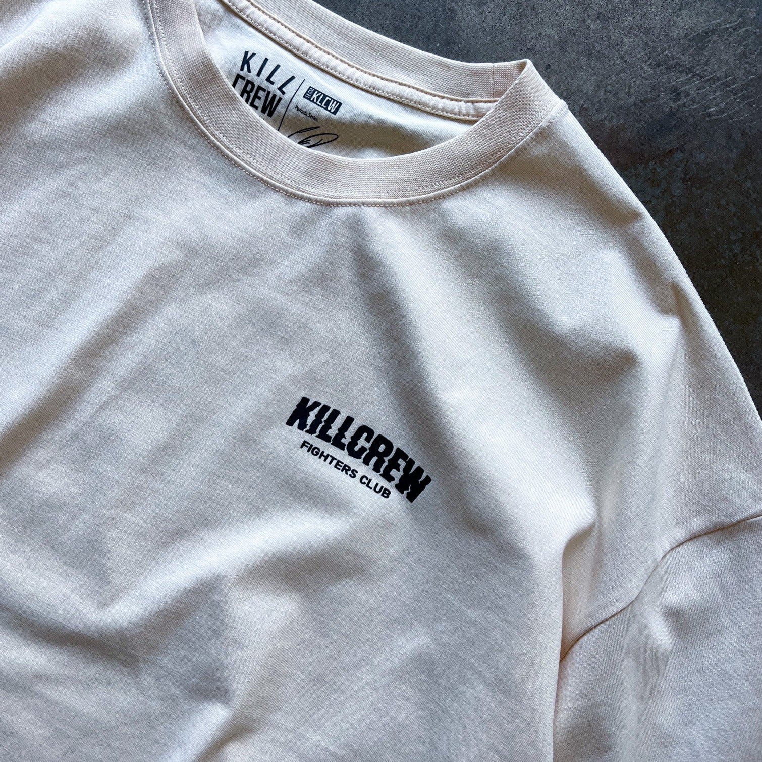 OVERSIZED RIGOROUS TRAINING T-SHIRT - CREAM / BLACK